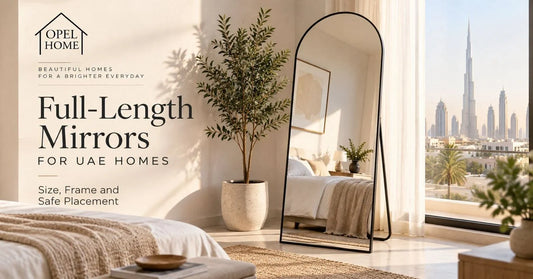Black arch full-length mirror on a stand beside a bed, with a Dubai skyline view