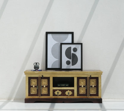 Wooden entertainment console with decorative items against a white wall