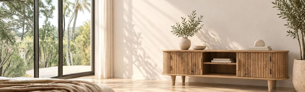 Arbela solid mango wood two-door TV unit in a UAE living room